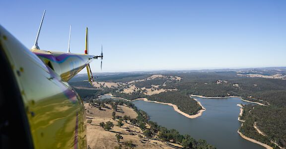 Flying over a reservoir, Barossa Valley, Australia. CC:Barossa Helicopters