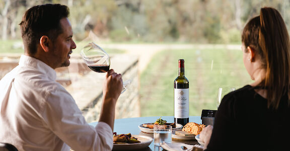 Enjoying wine and lunch at St Hugo, Australia. CC:Barossa Helicopters