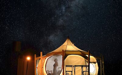 Lotus Belle tent under a starry night sky, Darwin, Australia. CC:Top End Safari Camp