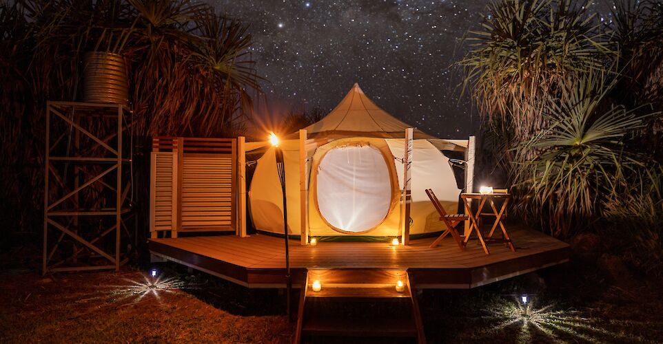 Lotus tent under a starry night sky, Darwin, Australia. CC:Top End Safari Camp