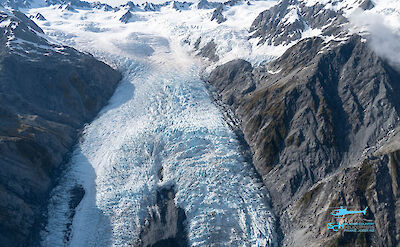 snow covered peaks of Franz Josef Glacier, New Zealand.
