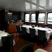 Dinning room on The Princesse Royal (Formerly the Magnifique) | Bike & Boat Tours