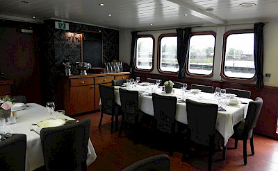 Dinning room on The Princesse Royal (Formerly the Magnifique) | Bike & Boat Tours
