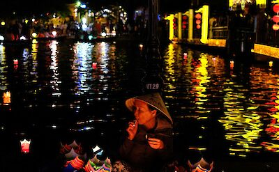 A woman with lanterns, Hoi An, Vietnam. Unsplash:Dheepak Mahesh