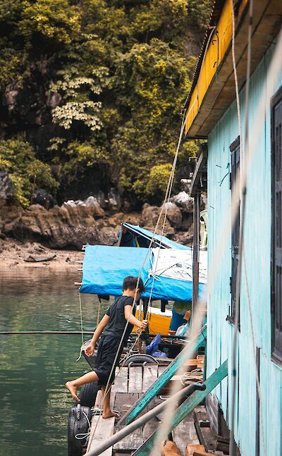 Child on a boat on the Mekong Delta, Vietnam. Unsplash:Constanza Leal