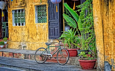 Biking in Hanoi, Vietnam. Unsplash:Steve Douglas