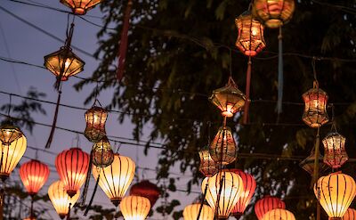 Lanterns in the streets, Hoi An, Vietnam. Unsplash:Kyle Thacker