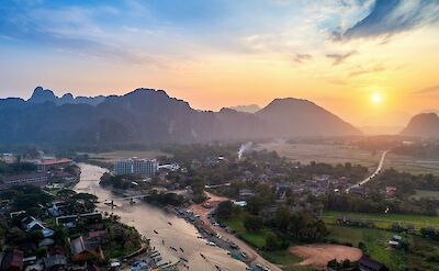 Laos at sunset, Vietnam. Unsplash:Getty Images