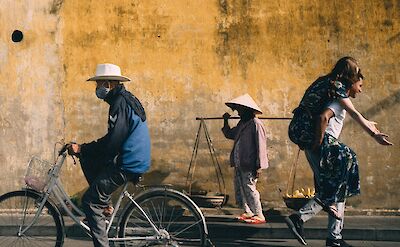 Locals and tourists in Hoi An, Vietnam. Unsplash:Hoi An Photographer