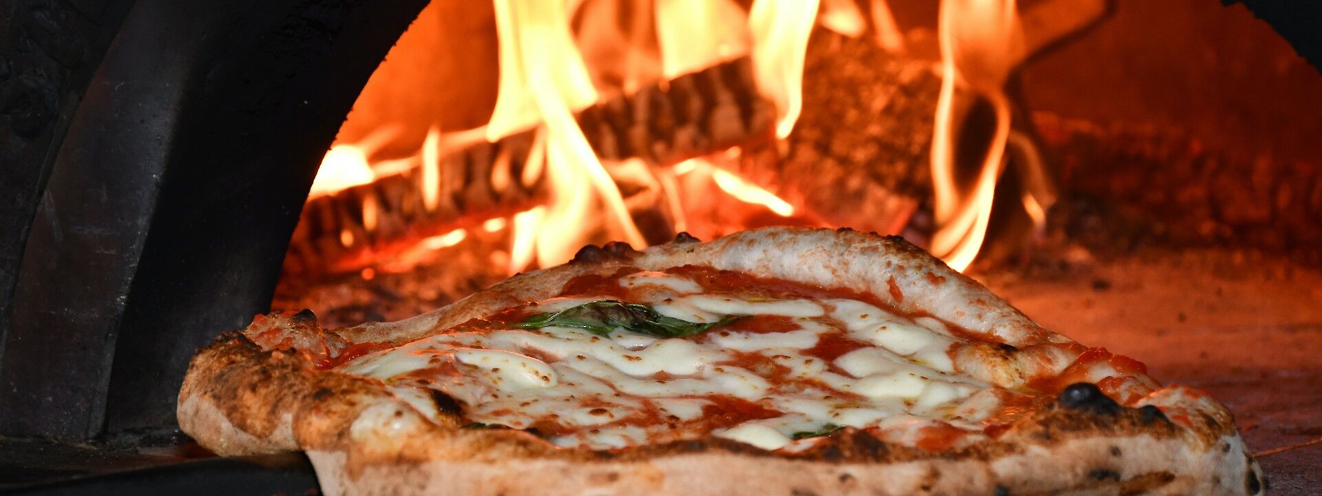 Pizza from the oven, Rome, Italy. Fabrizio Pullara@Unsplash