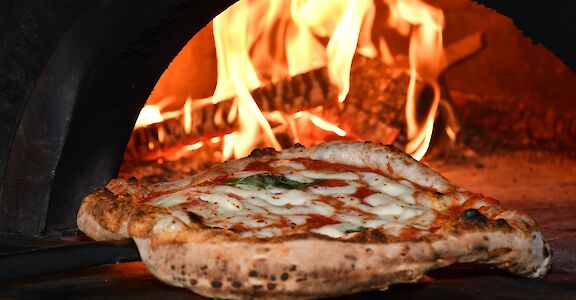 Pizza from the oven, Rome, Italy. Fabrizio Pullara@Unsplash
