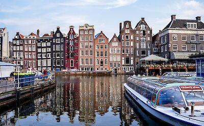 Boat on the canal, Amsterdam, Netherlands. Carlotta Segna@Unsplash