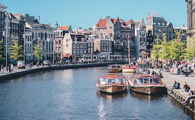 Boats on the canal, Amsterdam, Netherlands. Unsplash: Ethan Hu