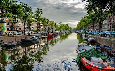 Reflections in the canal, Amsterdam, Netherlands. Unsplash: Debbie Molle