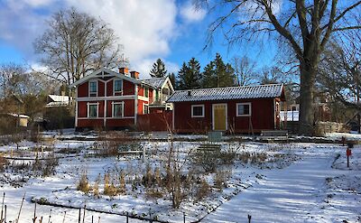 Snow covered house in Skansen, Norway. Flickr: Brian Dooley