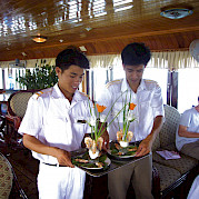 At your service - Vietnamese Junks | Bike & Boat Tours