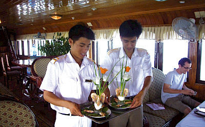 At your service - Vietnamese Junks | Bike & Boat Tours