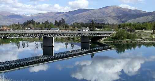 Reflection of clouds in Lake Dunstan, Cromwell, New Zealand. Flickr: Tim Parkinson