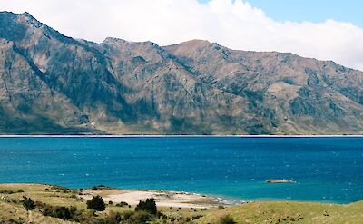 Scenic view of Lake Hawea, New Zeland. Unsplash:Adana Hulett