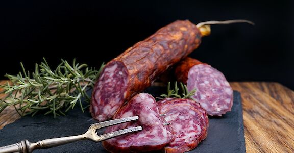 Delicious Salami on a plate, New York, USA. Unsplash: Wesual Click