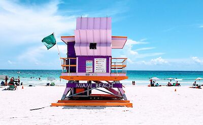 Purple beach hut, Miami Beach. Unsplash: Arnaud Civray