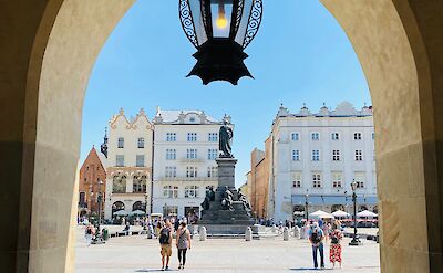 Archway in Krakow, Poland. Unsplash: Grafi Jeremiah