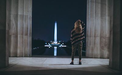 Standing in the Lincoln Memorial at night, Washington DC, USA. Unsplash: Roberto Nickson