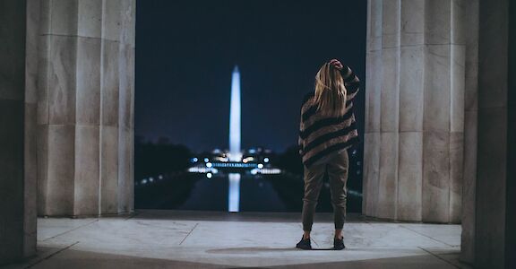 Standing in the Lincoln Memorial at night, Washington DC, USA. Unsplash: Roberto Nickson