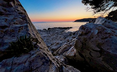 Sunset on a beach on Losinj, Croatia. Unsplash@Matthias Schroder