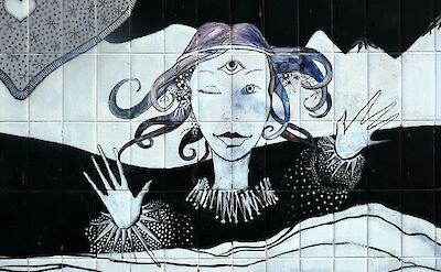 Mural of a girl, Cologne. Unsplash: Bekky Bekks