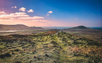 Pink skies above Valentia Island, Kerry, Ireland. Unsplash@K Mitch Hodge