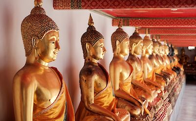 Golden Statues, Taling Chan, Bangkok, Thailand. Unsplash: Jacob Guse