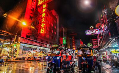 Tuk tuks in Bangkok at night, Bangkok, Thailand. Unsplash: Florian Wehde
