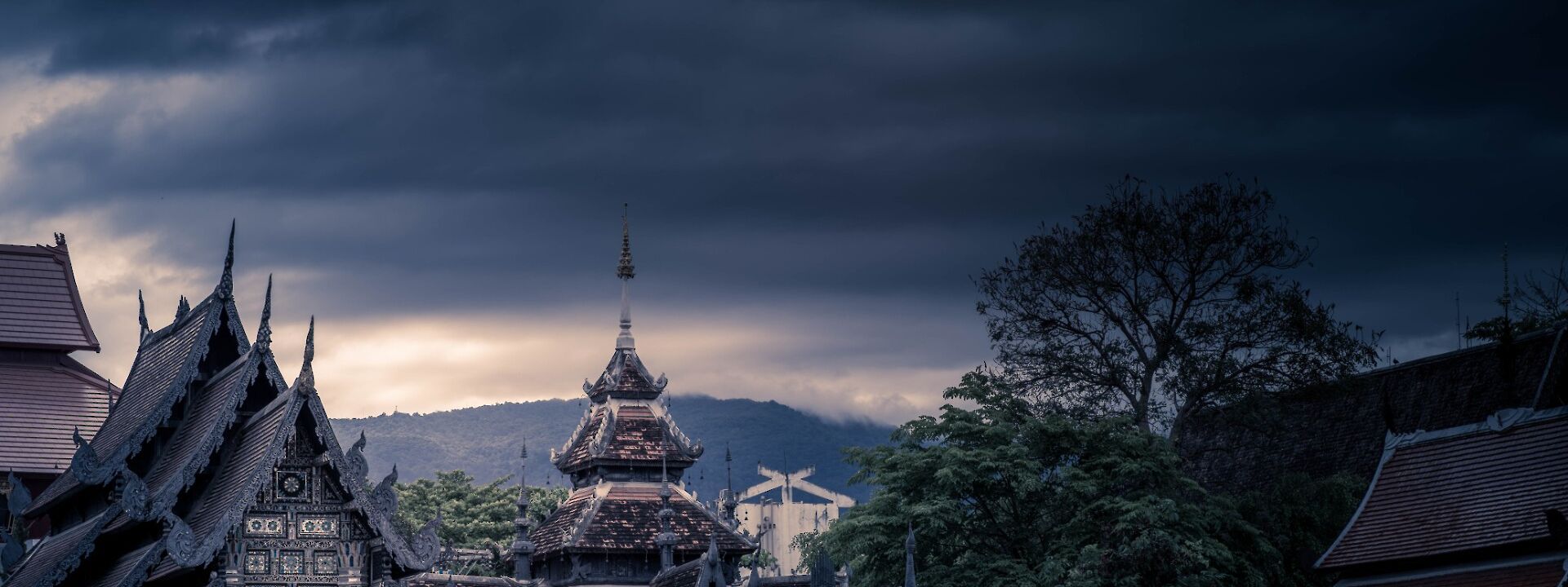 Chiang Mai under dark skies, Chiang Mai, Thailand. Unsplash: matt mu