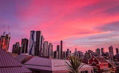 Pink skies over Melbourne, Australia. Unsplash: Krista Purmale