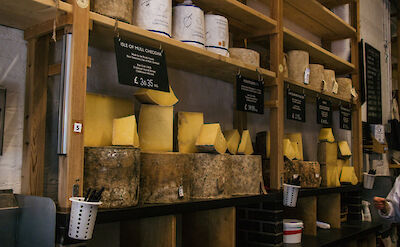 Various cuts of cheese in a famous cheese shop in London, England. CC: Eating Europe