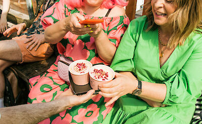 Enjoying cups of ice cream, London, England. CC: Eating Europe