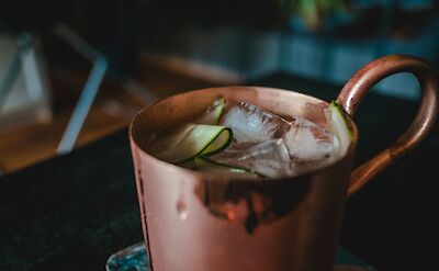 Vodka in a mug. Unsplash: Alex Plesovskich