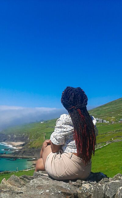 Looking out to sea in Dingle, Ireland. Unsplash@Dahlia E Akhaine