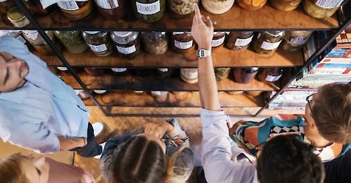 Discovering ingredients on a food tour, Gdansk, Poland.