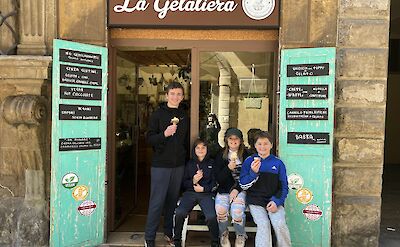 Tasting gelato at San Lorenzo market, Florence.