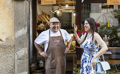 Chatting with local shopkeepers, Florence.