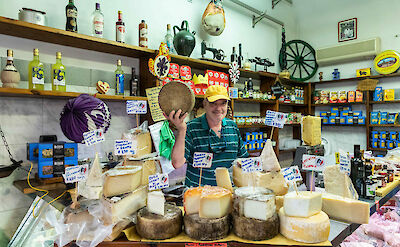 Local cheese seller, Florence, Italy.