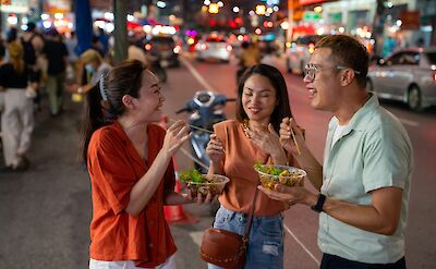 Eating with friends, Bangkok, Thailand. Getty Images@Unsplash