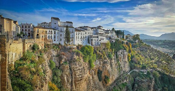 Whitewashed buildings perched above El Tajo Gorge. pixabay:rainhard2