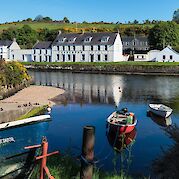 Ireland’s Northern Coastline E-Bike Tour - Cushendun in County Antrim, Northern Ireland. 55.124881, -6.042864