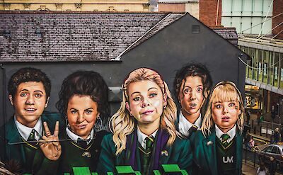 Mural of the Derry Girls in Londonderry, Northern Ireland. Unsplash:K. Mitch Hodge