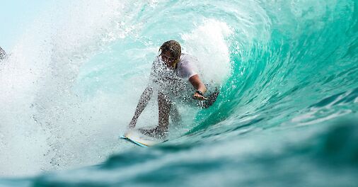 Surfer, Indonesia. Jeremy Bishop@Unsplash
