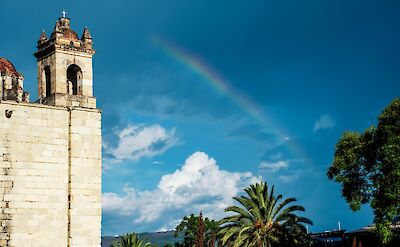 Rainbow behind the Santo Domingo church, Oaxaca, Mexico. Unsplash: Gabriel Tovar