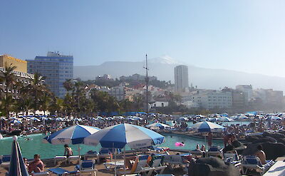 Sunbathers in Tenerife, Spain. CC:Foxbasealpha